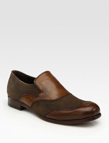 The perfect marriage of leather and canvas sets the tone for this rustic-inspired slip on loafer crafted in Italy.Leather/Canvas upperLeather liningLeather soleMade in Italy The perfect marriage of leather and canvas sets the tone for this rustic-inspired slip on loafer crafted in Italy.Leather/Canvas upperLeather liningLeather soleMade in Italy