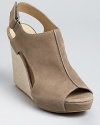 With sleek details, these DKNY wedges feel urban and modern. A seam detail down the front and cut-out sides lend finishing touches.
