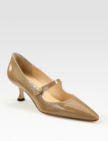 Patent leather articulated in a demure yet classic Mary Jane design.Self-covered heel, 2 (50mm) Button ankle strap Pointed toe Leather lining and sole Padded insole Made in ItalyOUR FIT MODEL RECOMMENDS ordering one size up as this style runs small. Patent leather articulated in a demure yet classic Mary Jane design.Self-covered heel, 2 (50mm) Button ankle strap Pointed toe Leather lining and sole Padded insole Made in ItalyOUR FIT MODEL RECOMMENDS ordering one size up as this style runs small.