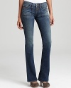 A bell-bottom silhouette lends '70s panache to these True Religion jeans, finished in a faded wash for extra vintage charm.