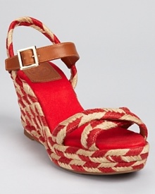 Sophisticated and summery, these charming Tory Burch espadrilles boast a two-tone palette and geometric pattern. Go bold in bright mustard or romantic in red, or opt for classic khaki. Sophisticated and summery, these charming Tory Burch espadrilles boast a two-tone palette and geometric pattern. Go bold in bright mustard or romantic in red, or opt for classic khaki.