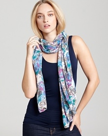 Warm up your spring ensemble with a light and airy scarf featuring a gorgeous floral print. Warm up your spring ensemble with a light and airy scarf featuring a gorgeous floral print.