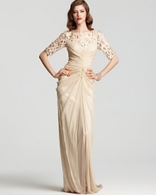 Unique beaded lattice detail lends an air of drama to this evening-perfect gown from Tadashi Shoji. Unique beaded lattice detail lends an air of drama to this evening-perfect gown from Tadashi Shoji.