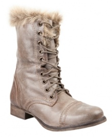 Laid-back and lax with a touch of high glamour. The Minkee boots by Steve Madden warm up a classic utility design with trendy faux fur trim. Laid-back and lax with a touch of high glamour. The Minkee boots by Steve Madden warm up a classic utility design with trendy faux fur trim.