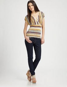 Artful stripes and super-short dolman sleeves complement this fitted crossover v-neck. Crossover v-neckShort dolman sleeves60% rayon/40% cottonHand washImportedModel shown is 5'10 (177cm) wearing US size Small. Artful stripes and super-short dolman sleeves complement this fitted crossover v-neck. Crossover v-neckShort dolman sleeves60% rayon/40% cottonHand washImportedModel shown is 5'10 (177cm) wearing US size Small.