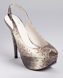 In glossy, snake embossed leather, Stuart Weitzman's Vevey platforms boast a petite peep toe and adjustable slingback. In glossy, snake embossed leather, Stuart Weitzman's Vevey platforms boast a petite peep toe and adjustable slingback.