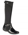 Tally-ho! The military-inspired Adrienne riding boots feature a smooth, rounded toe and logo buckle embellishment for a fabulous, yet comfortable addition to your wardrobe.