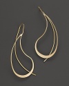 Slim, undulating teardrops of 14K yellow gold.