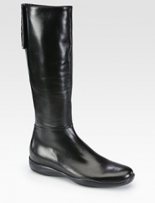 A signature logo detail and easy zip closure backs this traditional leather boot. Rubber heel, 1 (25mm)Shaft, 15Leg circumference, 13½Leather upperBack zip and velcro closureLeather liningRubber solePadded insoleMade in ItalyOUR FIT MODEL RECOMMENDS ordering one size up as this style runs small. A signature logo detail and easy zip closure backs this traditional leather boot. Rubber heel, 1 (25mm)Shaft, 15Leg circumference, 13½Leather upperBack zip and velcro closureLeather liningRubber solePadded insoleMade in ItalyOUR FIT MODEL RECOMMENDS ordering one size up as this style runs small.