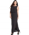 Onyx's plus size gown features a flattering blouson-style bodice and beaded shoulders.