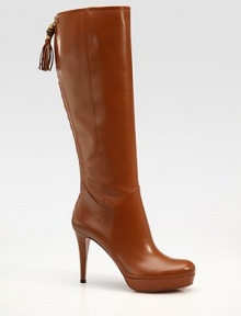 Leather silhouette with goldtone hardware and tassel and bamboo details. Self-covered heel, 3½ (90mm) Self-covered platform, ½ (15mm) Compares to a 3 heel (75mm) Shaft, 16½ Back zip Leather upper Leather lining Padded insole Imported Leather silhouette with goldtone hardware and tassel and bamboo details. Self-covered heel, 3½ (90mm) Self-covered platform, ½ (15mm) Compares to a 3 heel (75mm) Shaft, 16½ Back zip Leather upper Leather lining Padded insole Imported