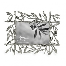 The Olive Branch Collection takes its inspiration from the intricacies of form and texture found in foliage from around the world. By interpreting plant forms in cast metal, Aram presents work, which is evocative of a natural environment transformed and redefined. Each piece is an intimate expression of Aram's individual creativity as well as an object of infinite and timeless meaning. The Olive Branch Collection takes its inspiration from the intricacies of form and texture found in foliage from around the world. By interpreting plant forms in cast metal, Aram presents work, which is evocative of a natural environment transformed and redefined. Each piece is an intimate expression of Aram's individual creativity as well as an object of infinite and timeless meaning.