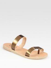 Soft leather footbed topped with glistening metallic leather straps and an unexpected toe ring. Metallic leather upperLeather lining and soleMade in GreeceOUR FIT MODEL RECOMMENDS ordering true whole size; ½ sizes should order the next whole size up. Soft leather footbed topped with glistening metallic leather straps and an unexpected toe ring. Metallic leather upperLeather lining and soleMade in GreeceOUR FIT MODEL RECOMMENDS ordering true whole size; ½ sizes should order the next whole size up.