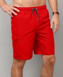 Hit the beach with signature minimalist style. This Tommy Hilfiger suit brings the cool with you. Hit the beach with signature minimalist style. This Tommy Hilfiger suit brings the cool with you.