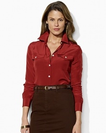 Inspired by rugged safari looks, the classic shirt is updated for chic femininity in airy, fluid silk. Inspired by rugged safari looks, the classic shirt is updated for chic femininity in airy, fluid silk.