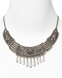 Rock the casbah with this engraved statement necklace from Vanessa Mooney. Crafted of silver plate with hanging beads, it's a perfect way to take this season's exotic influences to your jewel box. Rock the casbah with this engraved statement necklace from Vanessa Mooney. Crafted of silver plate with hanging beads, it's a perfect way to take this season's exotic influences to your jewel box.