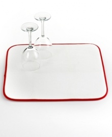 Where dishes go to dry. Cushioned and super absorbent, this kitchen mat sets up a place where your delicate dishes and stemware, plus everyday essentials, can hang out to dry after a wash. The folding, machine-washable design is perfect for easy storage and quick cleanup, too. Where dishes go to dry. Cushioned and super absorbent, this kitchen mat sets up a place where your delicate dishes and stemware, plus everyday essentials, can hang out to dry after a wash. The folding, machine-washable design is perfect for easy storage and quick cleanup, too.