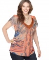 Make your style mark with One World's short sleeve plus size top, flaunting a beaded neckline and sublimated print.