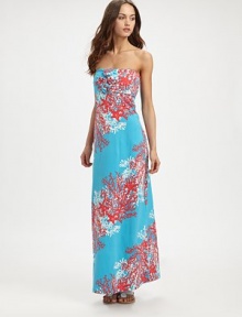 Designed with vivid color and an easy, strapless top complemented by an ankle-skimming length. Rosette details on strapless topEmpire waist92% cotton/8% spandexMachine washImported