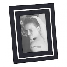 This modern design draws the eye with a silver bezel accent, then steps aside so you can admire your favorite photo without distraction. Featuring a black leather cover for a luxurious touch. This modern design draws the eye with a silver bezel accent, then steps aside so you can admire your favorite photo without distraction. Featuring a black leather cover for a luxurious touch.