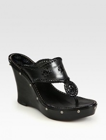 A supple leather sandal with funky details like stud trim and shapely wood wedge.Wooden heel, 4½ (115mm) Wooden platform, 1½ (40mm) Compares to a 3 heel (75mm) Open toe Slip-on style Leather lining Padded insole Rubber sole Made in USAOUR FIT MODEL RECOMMENDS ordering true size.. A supple leather sandal with funky details like stud trim and shapely wood wedge.Wooden heel, 4½ (115mm) Wooden platform, 1½ (40mm) Compares to a 3 heel (75mm) Open toe Slip-on style Leather lining Padded insole Rubber sole Made in USAOUR FIT MODEL RECOMMENDS ordering true size..
