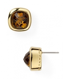 Combining a neutral color palette with faceted sparkle, this pair of crystal stud earrings from T Tahari will lend every look instant glamor. Combining a neutral color palette with faceted sparkle, this pair of crystal stud earrings from T Tahari will lend every look instant glamor.