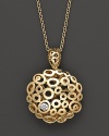 From the Mauresque collection, gold lace-inspired drop pendant in 18 Kt. yellow gold with diamond pavé. With signature ruby accent. Designed by Roberto Coin.