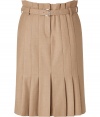 Luxurious skirt made ​.​.of fine, camel-colored wool - Particularly pleasing quality - Stylish pleated look - With a high waistband and belt - The cut is slim, but loose. in exactly knee length - A modern classic and classy all-around piece - Works in the office with a blazer and a thin blouse or for evening with a top and high heels