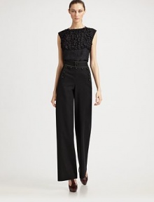 Subtly textured silk cloqué, adorned with rows of ruffles on the front.Sleeveless pullover Ruffled front bodice Back zipper Silk; dry clean Made in USA Subtly textured silk cloqué, adorned with rows of ruffles on the front.Sleeveless pullover Ruffled front bodice Back zipper Silk; dry clean Made in USA