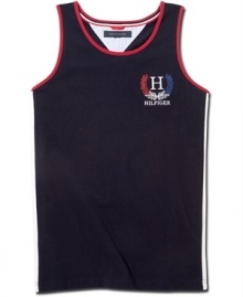 Athletic aesthetic. Clean lines on this Guilford tank from Tommy Hilfiger make it a stylish choice to throw on before a workout or big game. Athletic aesthetic. Clean lines on this Guilford tank from Tommy Hilfiger make it a stylish choice to throw on before a workout or big game.