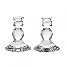 With a classic scalloped shape, these luminous Vera Wang candlesticks lend timeless grandeur to your table. With a classic scalloped shape, these luminous Vera Wang candlesticks lend timeless grandeur to your table.