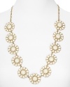 Let kate spade new york's glossy daisy chain take your jewel box in a whimsical direction. With oversized floral links, this necklace is a match for simple silhouettes.