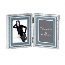 Vera Wang's With Love folding frame features seven intricate jewelry-inspired bands; a lovely display for your fondest memories or a thoughtful gift for a friend. Vera Wang's With Love folding frame features seven intricate jewelry-inspired bands; a lovely display for your fondest memories or a thoughtful gift for a friend.