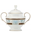 Extraordinarily detailed yet amazingly dishwasher safe, the Palatial Garden sugar bowl from Marchesa by Lenox combines teal blossoms, intricate gold vines and velvety brown accents in gold-banded bone china.