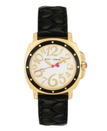 A little old-fashioned and a little over-the-top. Watch by Betsey Johnson crafted of black quilted leather strap and round polished gold tone stainless steel case with black bezel. White dial features whimsical gold tone numerals, gold tone hour and minute hands, pink second hand with heart and logo. Quartz movement. Water resistant to 30 meters. Two-year limited warranty. A little old-fashioned and a little over-the-top. Watch by Betsey Johnson crafted of black quilted leather strap and round polished gold tone stainless steel case with black bezel. White dial features whimsical gold tone numerals, gold tone hour and minute hands, pink second hand with heart and logo. Quartz movement. Water resistant to 30 meters. Two-year limited warranty.