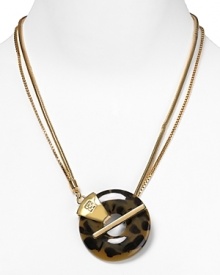 Adorn a plunging neckline with Trina Turk's ring pendant necklace. The classic tortoiseshell tone teams with everything in your closet. Adorn a plunging neckline with Trina Turk's ring pendant necklace. The classic tortoiseshell tone teams with everything in your closet.