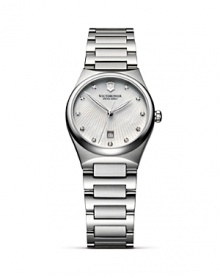 A poised timepiece from Victorinox Swiss Army features a luminous wristband and geometric-inspired diamond markers. A poised timepiece from Victorinox Swiss Army features a luminous wristband and geometric-inspired diamond markers.