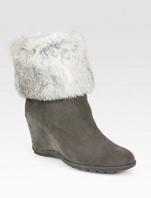 Luscious rabbit fur upgrades this casual suede boot with a versatile fold-over shaft. Hidden wedge, 3½ (90mm)Unfolded shaft, 9Leg circumference, 12Weatherproof suede upper with faux fur trimBack zipBreathable microfiber liningSlip resistant rubber solePadded insoleMade in Italy Luscious rabbit fur upgrades this casual suede boot with a versatile fold-over shaft. Hidden wedge, 3½ (90mm)Unfolded shaft, 9Leg circumference, 12Weatherproof suede upper with faux fur trimBack zipBreathable microfiber liningSlip resistant rubber solePadded insoleMade in Italy