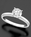 Love that's meant to last a lifetime. This beautiful engagement ring features round-cut diamond set in 14k white gold.
