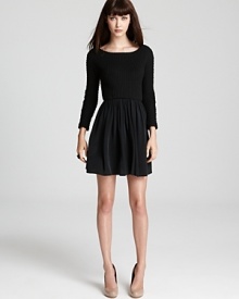 This Thakoon Addition dress expertly mixes textures with a ribbed sweater top and silk pleated skirt. This Thakoon Addition dress expertly mixes textures with a ribbed sweater top and silk pleated skirt.