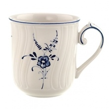 Delicate dark blue floral sprays adorn this timeless mug made from premium porcelain. Delicate dark blue floral sprays adorn this timeless mug made from premium porcelain.