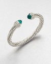 From the Cable Classics Collection. Dazzling diamonds accent this signature sterling silver cable design with green onyx end caps. Green onyxDiamonds, .48 tcwSterling silverDiameter, about 2Slip-on styleImported 