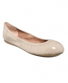 Ease and elegance define this simplicity of Vince Camuto's Ellen flats. Made in patent leather with a classic round-toe silhouette. Ease and elegance define this simplicity of Vince Camuto's Ellen flats. Made in patent leather with a classic round-toe silhouette.