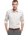 Change your everyday pattern with this woven shirt from Calvin Klein.
