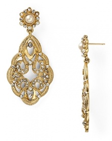 As if unearthed from a socialite's jewel box, this pair of drop earrings from Carolee Lux flaunt an heirloom quality with ornate pearl and crystal accents. As if unearthed from a socialite's jewel box, this pair of drop earrings from Carolee Lux flaunt an heirloom quality with ornate pearl and crystal accents.