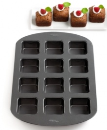 Raise the bar in your bakery-top these square brownie bars with an array of different tasty sweets and create a delicious & enticing spread for any party scene or celebration. Creating a dozen individual mini cakes, this durable, nonstick pan heats up fast and evenly and then cleans up quick in the dishwasher. 10-year warranty. Raise the bar in your bakery-top these square brownie bars with an array of different tasty sweets and create a delicious & enticing spread for any party scene or celebration. Creating a dozen individual mini cakes, this durable, nonstick pan heats up fast and evenly and then cleans up quick in the dishwasher. 10-year warranty.