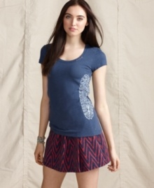 Look good while doing good! This beaded Tommy Hilfiger tee is part of a collection that benefits African communities. Look good while doing good! This beaded Tommy Hilfiger tee is part of a collection that benefits African communities.