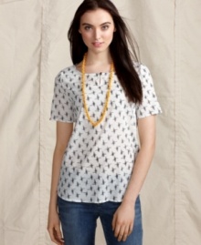 This cotton top from Tommy Hilfiger is part of a collection inspired by Africa. All proceeds go to Millennium Promise, which benefits the development of African communities -- a stylish way to do good! This cotton top from Tommy Hilfiger is part of a collection inspired by Africa. All proceeds go to Millennium Promise, which benefits the development of African communities -- a stylish way to do good!