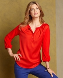 Pack a stylish punch in Tommy Hilfiger's breezy tunic, crafted in a statement-making shade that looks so on-trend with your boldest colored jeans. Pack a stylish punch in Tommy Hilfiger's breezy tunic, crafted in a statement-making shade that looks so on-trend with your boldest colored jeans.