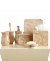 The definition of timeless luxury. The Travertine toothbrush holder renews your space with a naturally sophisticated look and stately appeal. Featuring pure travertine stone with a luxurious weight and smooth finish.